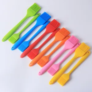 Colorful silicone baking brush set for BBQ, pastry, and oil basting. Heat resistant kitchen tool.