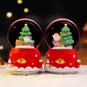 Kerst sneeuwbol muziekdoos met kerstman en boom, perfecte feestelijke bureaudecoratie cadeau.