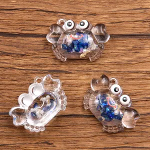 Transparent resin crab charms for DIY jewelry making, cute sea animal pendants for necklaces and bags.