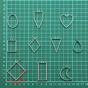 DIY colgantes de bisel abierto marcos de metal geométricos surtidos para manualidades