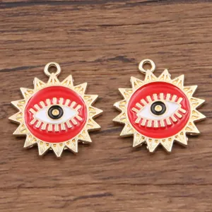 Detailed shot of gold tone alloy Turkish evil eye sun shape drop pendant DIY jewelry making