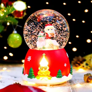 Christmas snow globe decoration with Santa Claus and glowing tree light for holiday gifts