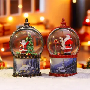 Détail veilleuse boule à neige de Noël, Père Noël en résine rétro avec des lumières LED.