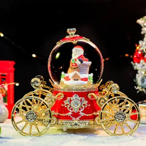 Weihnachtsmann Kutsche Schneekugel Spieluhr, exquisite rot goldene Feiertagsgeschenke.