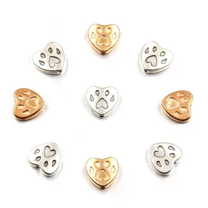 Gold and silver dog paw heart alloy beads for DIY jewelry making and bracelet connectors.