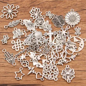 Mixed metal jewelry charms, antique silver flower butterfly leaf cross connectors for DIY crafts.