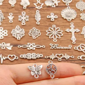 Assortment of DIY metal charm connectors silver tone charms for jewelry making crafts