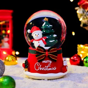 Christmas snow globe with cute snowman tree decor glowing desktop ornament for holiday gifts