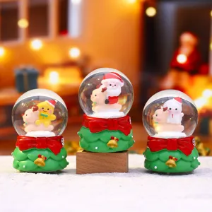 Christmas mini snow globe with deer and glowing water ball, cute holiday table decor and gift.