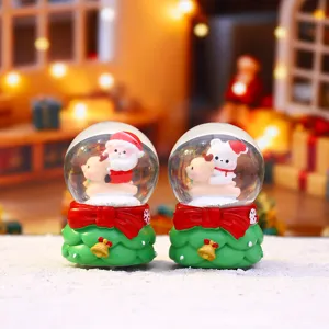 Cute Christmas snow globe with deer and Santa, mini glowing water ball for holiday decor.