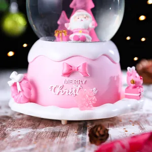 Rosa Weihnachts-Schneekugel Spieluhr, süße Weihnachtsmann Deko-Figur für festliche Geschenke.