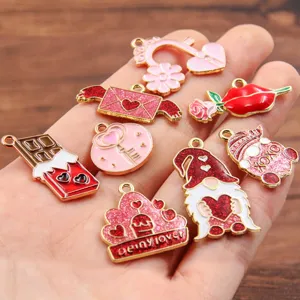 Detailed close-up shot of various Valentine day enamel charms alloy jewelry DIY accessories.