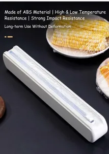 Vista detallada del dispensador de film transparente, herramienta de cocina blanca con cuchilla.