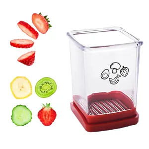 Portable kitchen fruit and vegetable slicer tool with clear container and sharp blades.