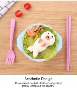 Close-up detail of cute seal shaped rice ball mold for bento and sushi making in kitchen.