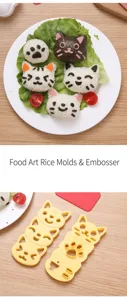Detail view of DIY cartoon cat rice ball mold and sushi embosser set for bento lunches.