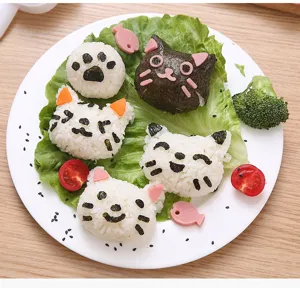 Detailed view of creative cat rice ball mold outcome, cute animal sushi making tool display.