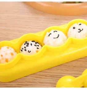 Gelbe Kunststoff Reiskugel Form 4 Fächer DIY Sushi Bento Maker Küchenwerkzeug