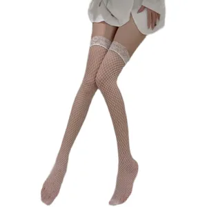 Close up detail of white lace fishnet thigh high stockings, sexy Japanese style hosiery.