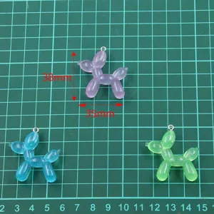 Detail view of cute translucent balloon dog resin charm pendants for DIY jewelry making.