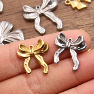 Stainless steel bow charm detail, perfect for DIY handmade jewelry earrings and necklaces.