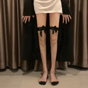 Black fishnet over-the-knee stockings with cute bows, sexy lace top gothic thigh high socks.