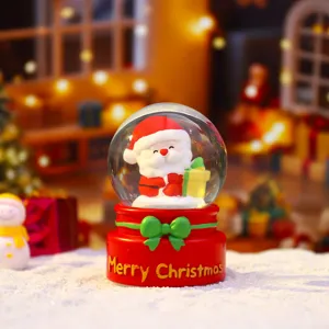 Christmas snow globe with cute Santa Claus figure glowing holiday gift decoration