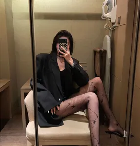 Damen schwarze Netzstrumpfhose mit Sternen Muster sexy Feinstrümpfe für Mode Streetwear Style