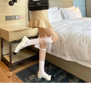Calze tubolari stile Lolita giapponese con fiocco in tulle per ragazze, dolci e fiabesche bianche.