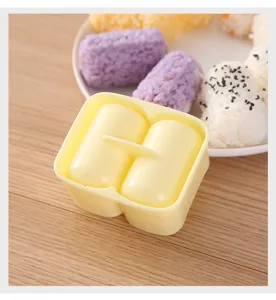 DIY two compartment rice ball mold, cylinder sushi maker and seaweed roll baking tool detail.