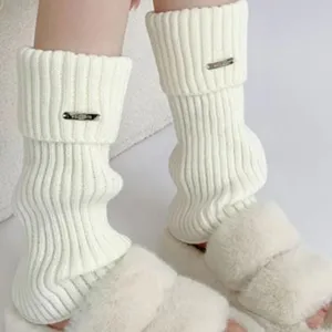White knitted leg warmers for women, cozy winter stack socks with metal decor, soft JK style.
