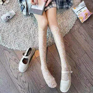 White lace jacquard pantyhose detail shot, elegant JK style hosiery for sweet outfits and daily wear.