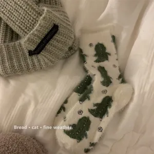 Fluffy fuzzy plush winter crew socks with cute green dinosaur print warm for women