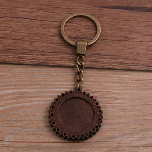 Porte-clés vide en bois bricolage avec anneau en bronze et pendentif rond sculpté.