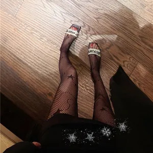 Damen schwarze Sternenmuster Netzstrumpfhose sexy Strumpfwaren für Frühling und Herbst.