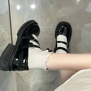 Cute Japanese JK black Mary Jane shoes with white frilly socks main view display.