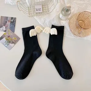 Black mid-tube socks with cute white 3D angel wings, sweet Japanese style for daily wear.