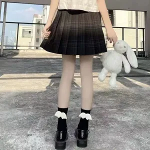 Cute Lolita black mid-calf socks with white angel wings, Japanese JK style detail view.