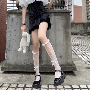 Chaussettes mollets ajourées en dentelle blanche été filet nœud papillon détail vue