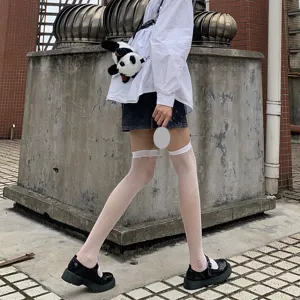 White over-the-knee fishnet stockings for women, breathable lace long thigh high socks.