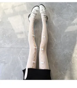 Japanische weiße Strumpfhose mit Schleifen für Damen, süße ausgehöhlte Strümpfe für den Alltag.