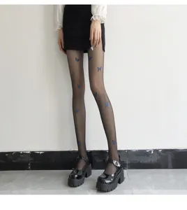 Sheer black pantyhose featuring delicate blue butterfly print details for stylish look.