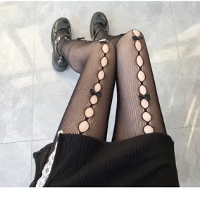 Schwarze Netzstrumpfhose mit hohlen Kreisen und süßen Schleifen, süße sexy Details.