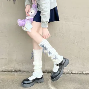 Cute white knit leg warmers with cross ribbons, sweet Lolita JK style autumn socks for women.