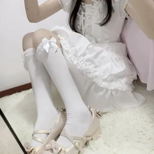 White lace bow mid calf socks detail view, soft girl sweet Lolita style hosiery accessory.