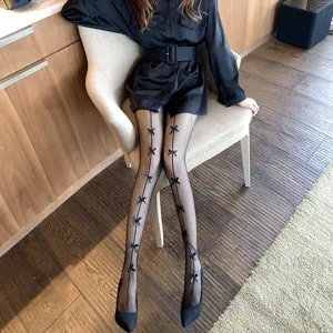 Black fishnet pantyhose for women, spring summer sexy sheer tights with cute bowknot details.