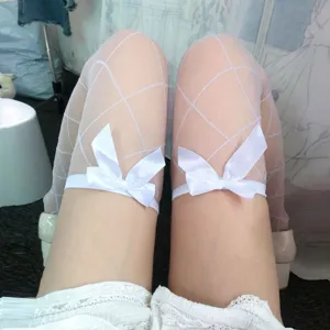 White diamond pattern thigh high over-the-knee stockings with sweet bowknot details.