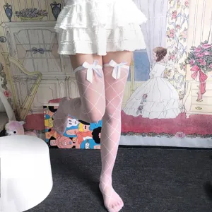 White sheer diamond pattern thigh high stockings with cute bows for sweet JK style outfits.