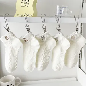 Cute cartoon embroidered white cotton short socks with 3d jacquard design for women style.