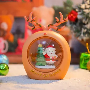 Christmas reindeer night light festive desktop decoration with Santa Claus and tree snow globe